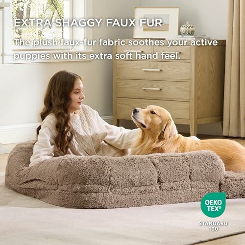 Woman and dog on a shaggy faux fur dog bed in a cozy room.