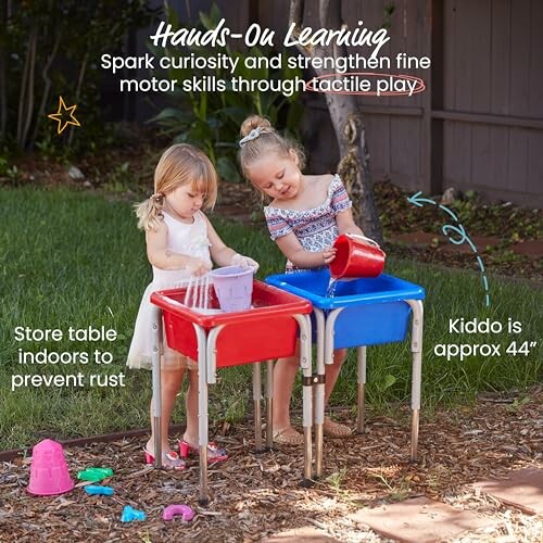 Two children playing with water tables outdoors.