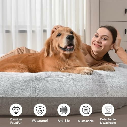 Woman lying on bed with golden retriever, showcasing product features: premium faux fur, waterproof, anti-slip, sustainable, detachable and washable.